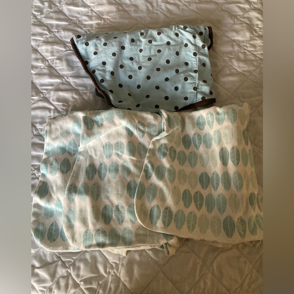 Sleeping sacks and swaddle blanket